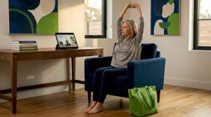 Woman stretching for joint pain relief at home