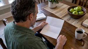 Patient reviewing a PRP insurance coverage letter