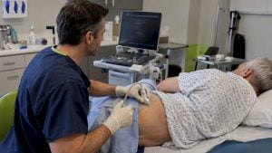 Clinician preparing a PRP injection near a hip
